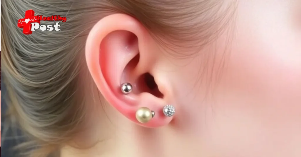 Ear Piercing Pain Chart: Which Piercing Hurts the Most? A detailed close-up of a human ear with multiple lobe and cartilage piercings, illustrating the areas evaluated on an ear piercing pain scale 1-10.