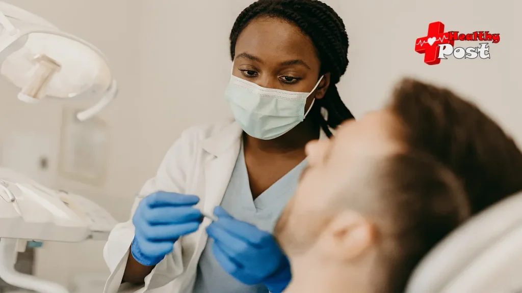 A professional endodontist performing a root canal procedure, representing dental specialization and career development.